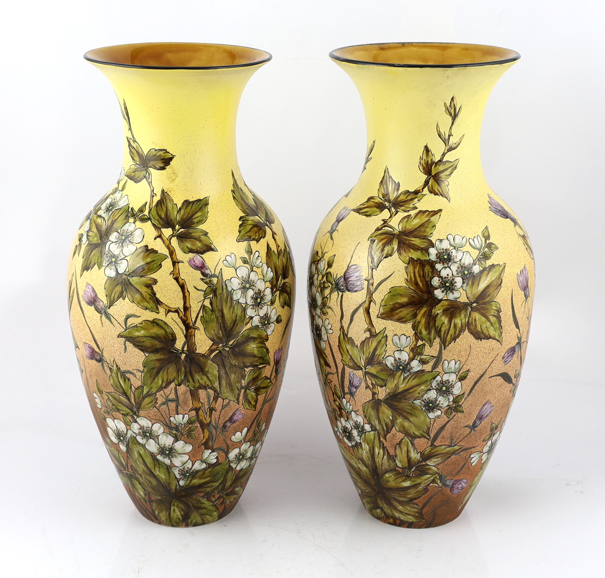 A pair of large Linthorpe painted earthernware vases, c.1880, designed by Christopher Dresser (1834-1904)